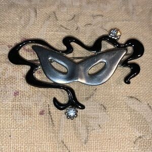 Masquerade brooch